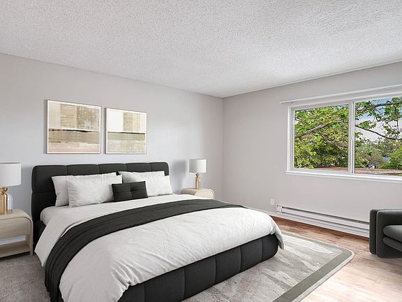 Bedroom includes walk-in closet, while overlooking the balcony