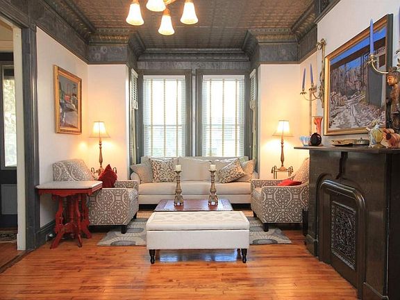 Formal Living Room, hard wood floors, tin ceilings, fireplac