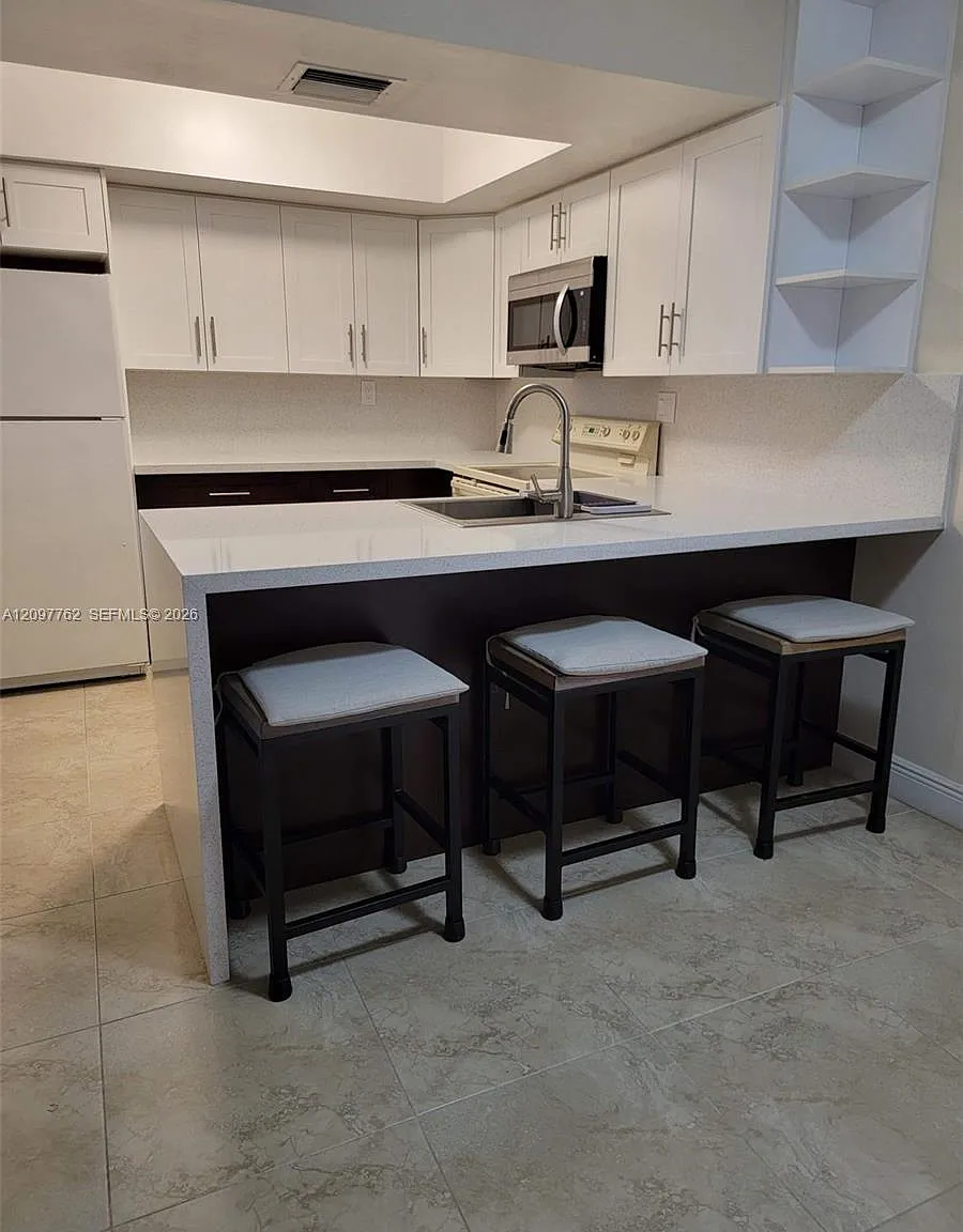 Terranova Condo #10 — Photo 1