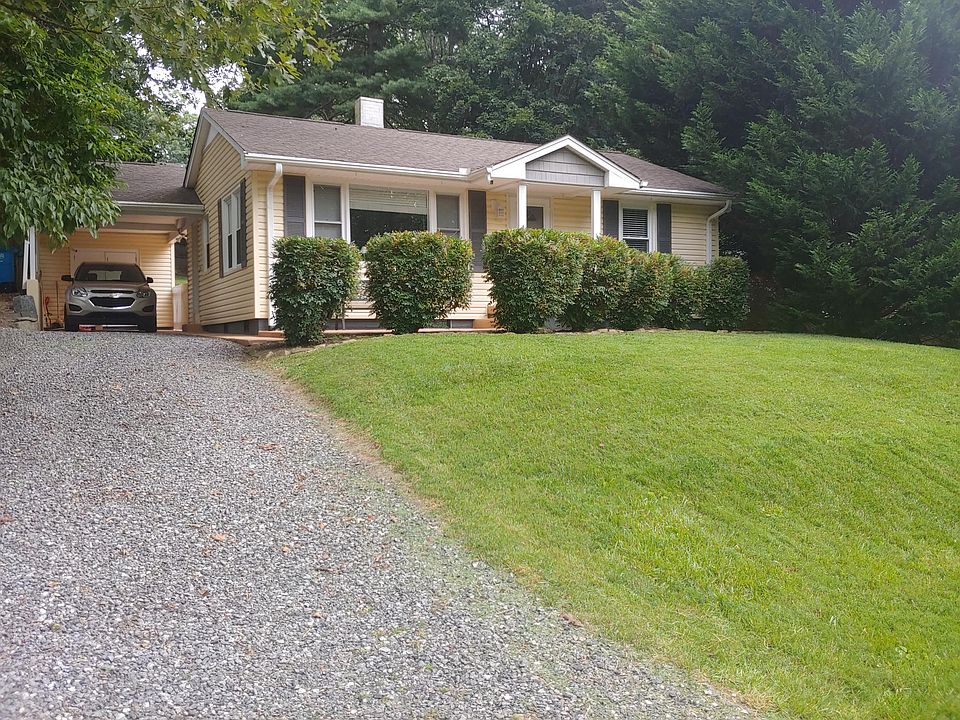 Gravel Driveway to Carport and Side Entry