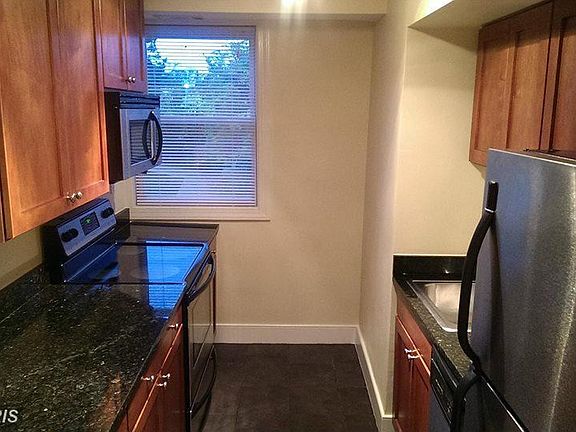 Kitchen with gleaming granite counter tops