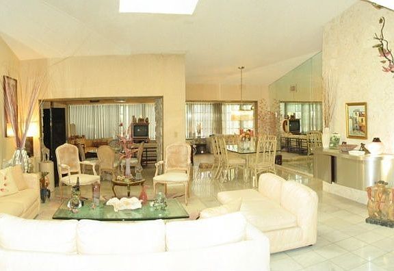 Spacious Living Area with Skylight