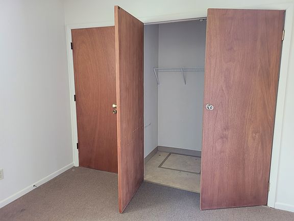 Washer/dryer area off livingroom and back door.