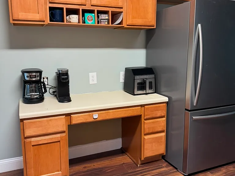 Kitchen desk area with Coffee maker, Keurig machine and air fryer