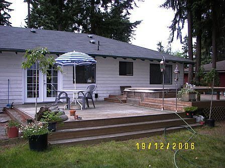 Wonderful deck to a great back yard 