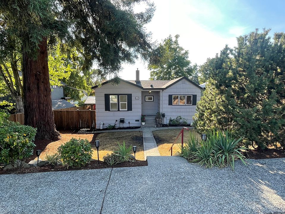 Charming West Seattle home with generous yard set back from the street with a good balance of trees and open space.