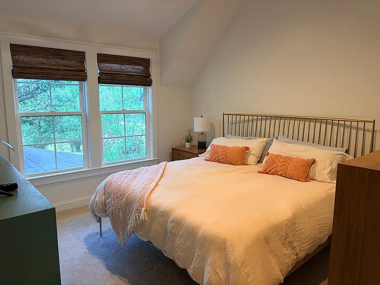 Master bedroom with vaulted ceilings
