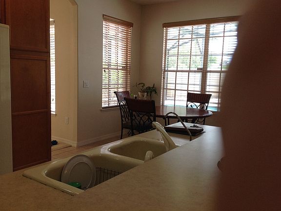 Kitchen with breakfast area overlooking pool