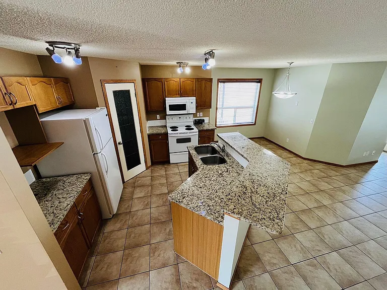 937 Arbour Lake Rd NW — Photo 2