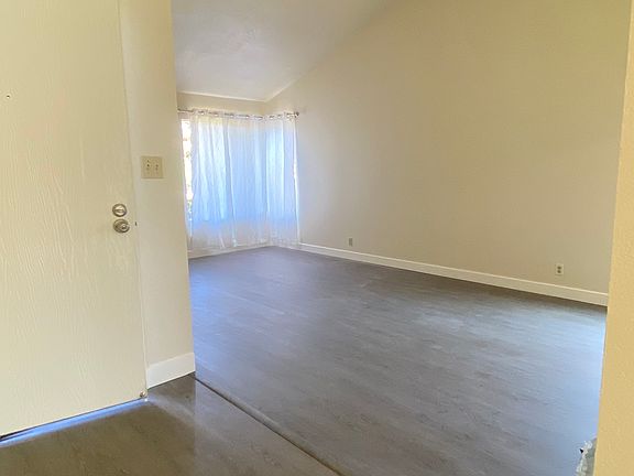 Entry way leading to living room and dining room