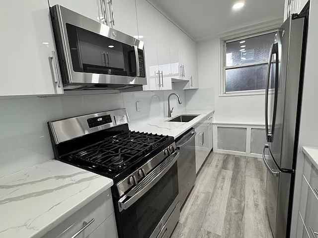 Kitchen with brand new GE stainless appliances (french door fridge, microwave, stove oven and dish washer)