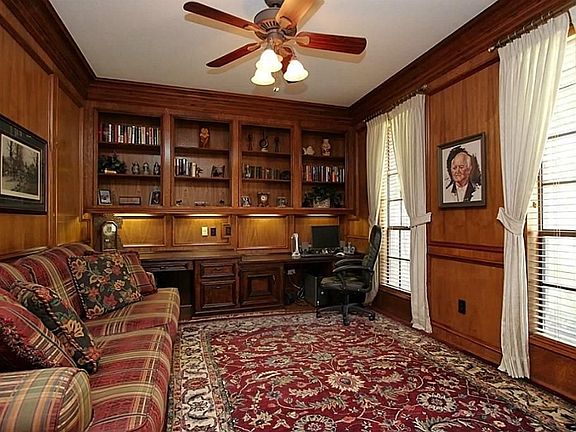 Paneled study with wall of built-ins