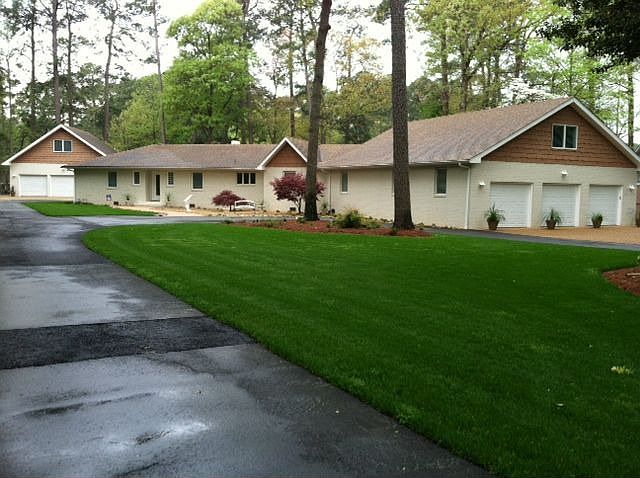 Exterior Front on Over 1 Acre Waterfront