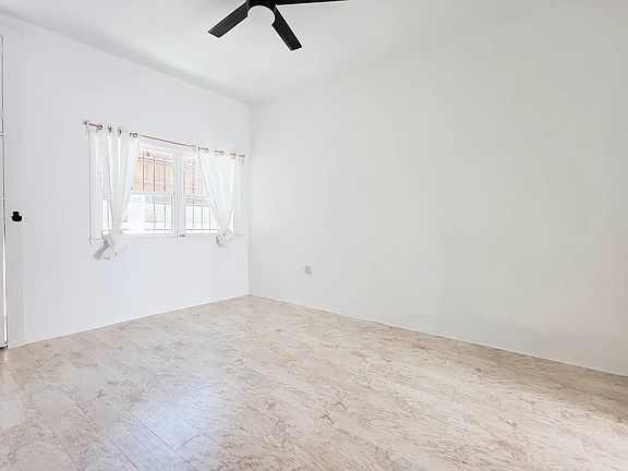 View of the living room facing the front door