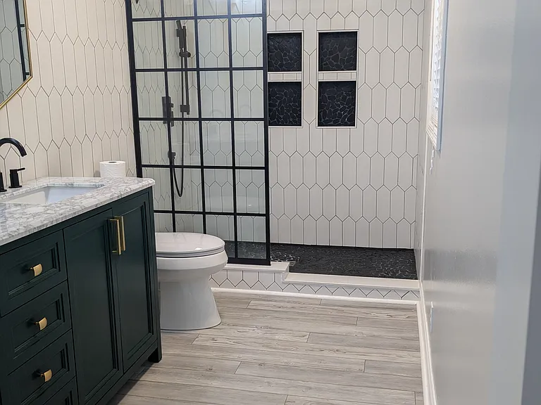 Master bathroom with walk-in shower featuring waterfall showerhead and detachable sprayer
