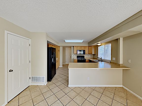 5th image of 20200 E 42nd Ave