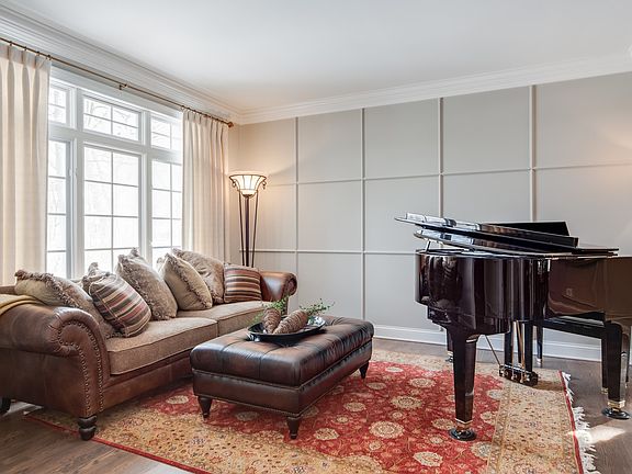 Formal Living Room with Hardwood Floor and Custom Moldings