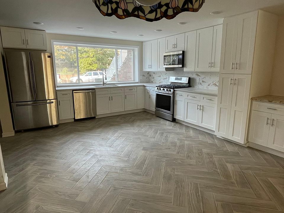 Kitchen with new stainless steel appliances