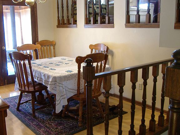 Enjoy diners in the informal dining room with French doors leading out to four