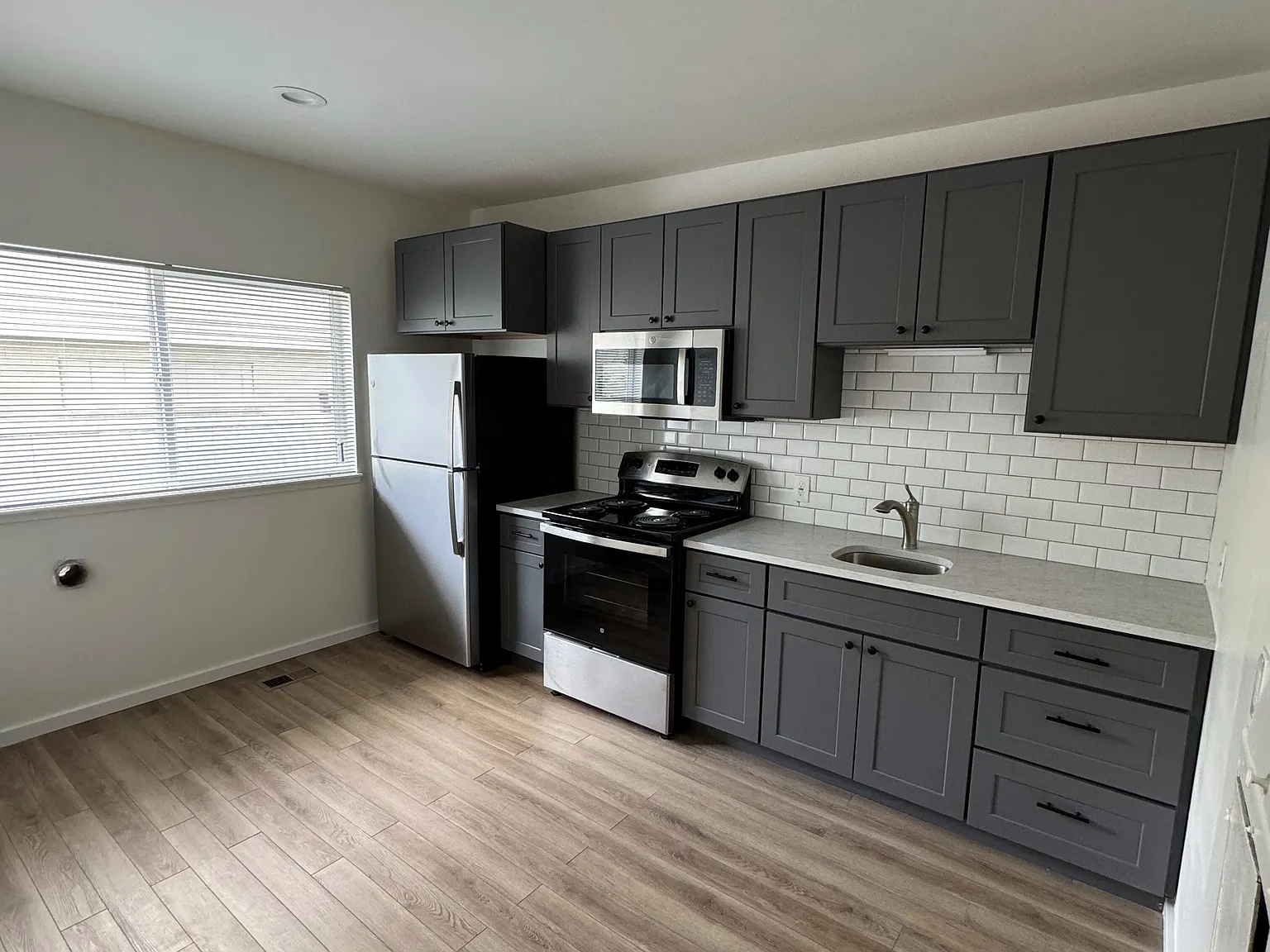 SLC Triplex — Photo 1