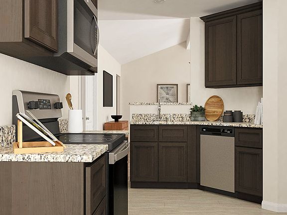 The chef-ready kitchen comes equipped with granite