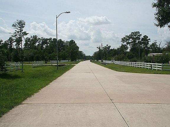 Facing towards the lake property is on your left
