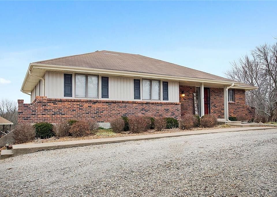 Terrific Raised Ranch with 2 car attached and Detached shop. Sits nice and high to catch views from every side!Lots of driveway 