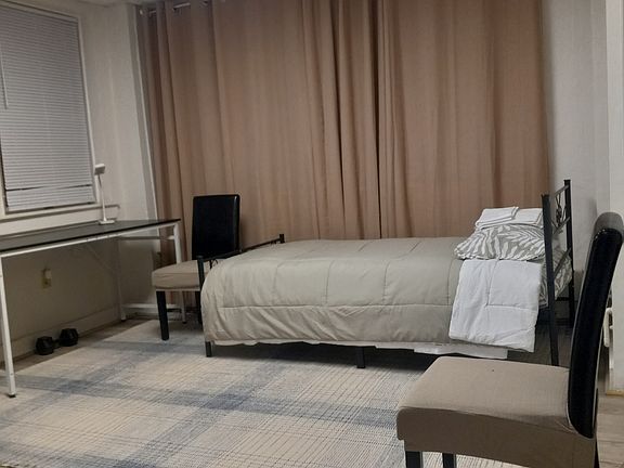 Living room with additional twin bed