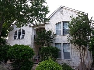 Location, location!  1 block from award winning NEISD Stone Oak E.S. Contemporary two story former Model Home to Crescent Oaks subdivision.
