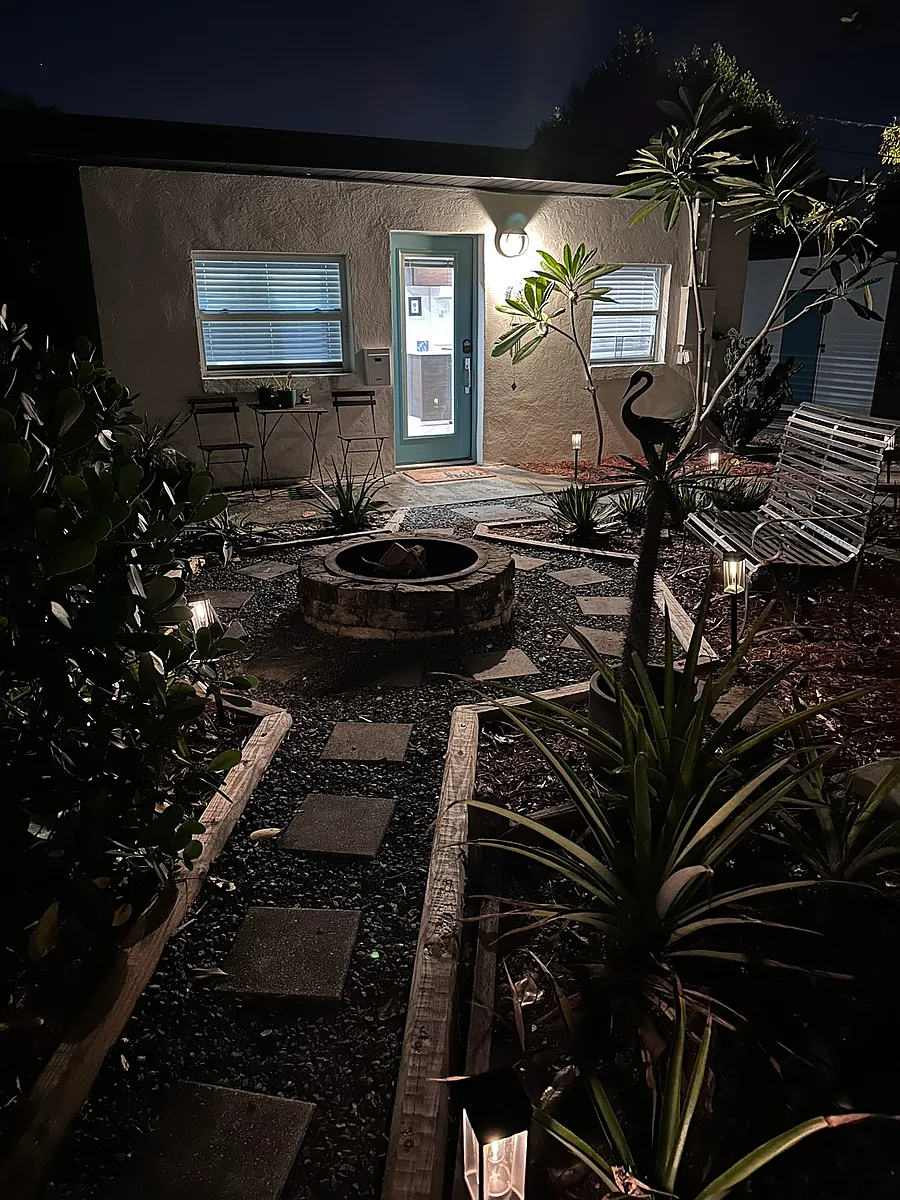 Shared firepit and beautiful landscaping - 4306 N Branch Ave #1