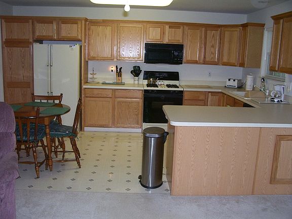 Large 16' Eat-In Kitchen opens to family room