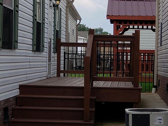 Side entrance and large deck.