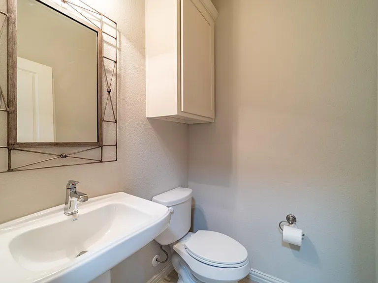 Tall cabinets in the half bath
