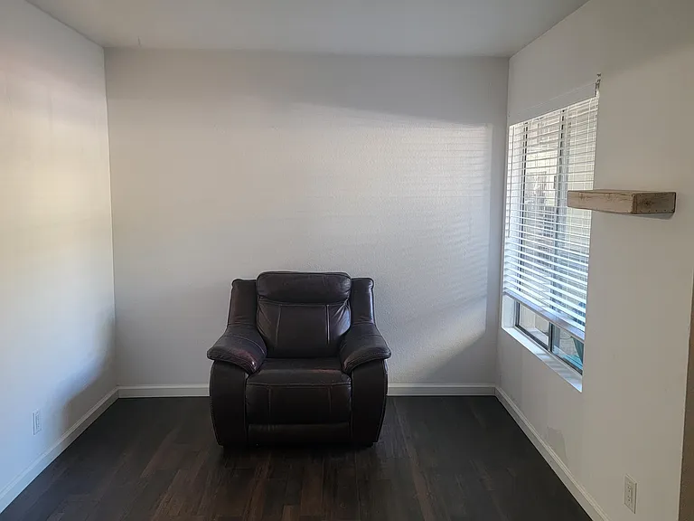 Bonus en-suite space, ideal for a home office or sitting room (oversized chair not included).