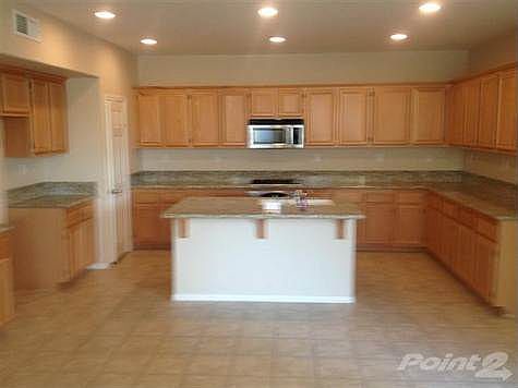 Kitchen offers lots of cupboards and a large pantry