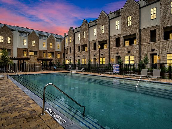 Brand new, gated, community swimming pool with pergola and gas grills for cookouts.