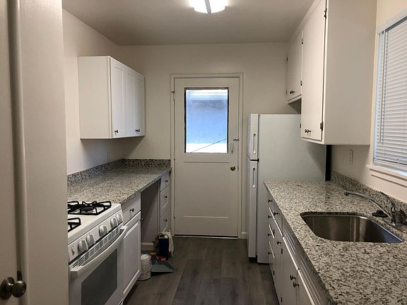 Kitchen with back entrance