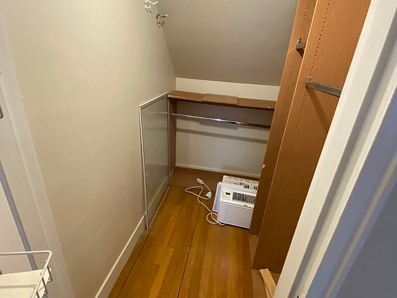 Walk in closet in bedroom.