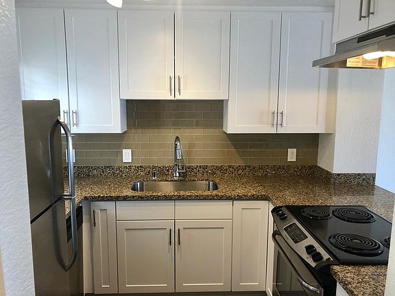 Spacious remodeled kitchen with stainless steel appliances