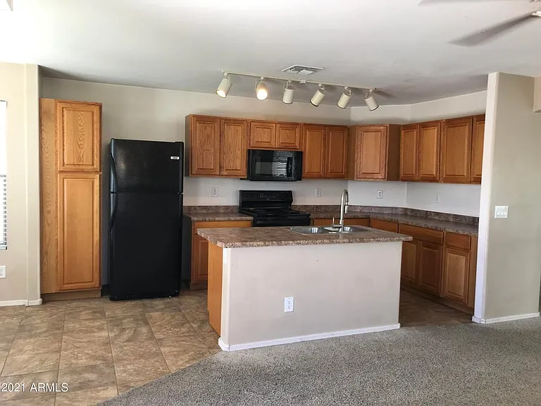806 S 111th Dr — Photo 12