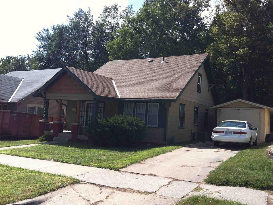 street view - garage pictured is associated with neighbors home. This property has off street parking but no garage
