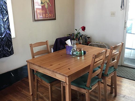 Dining Room adjacent to kitchen and double door to the outsi