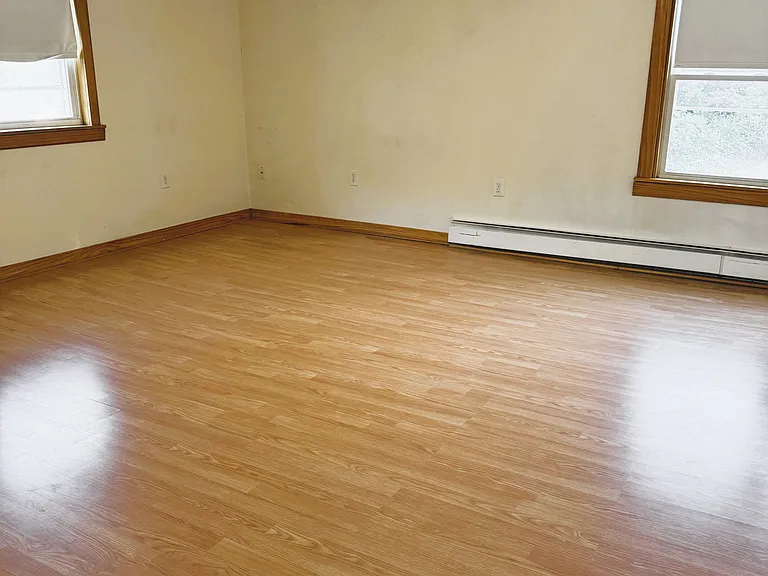 Huge bedroom 1 with hardwood floors