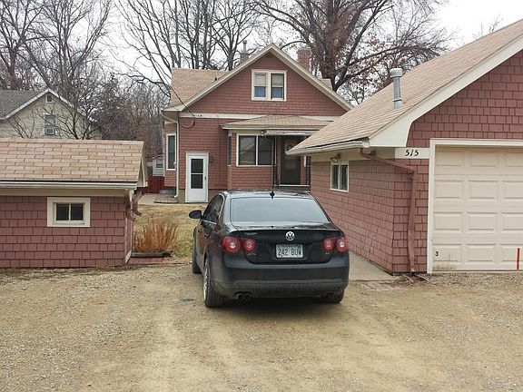 Rear of home showing parking area
