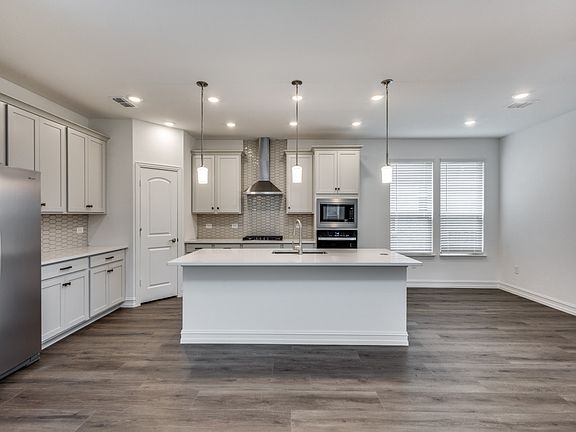 Kitchen with stainless steel appliances