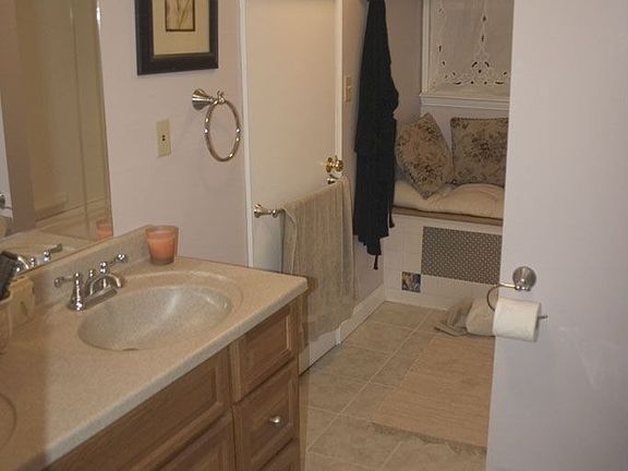 Lovely main bathroom: double sink, bath/shower, timed heater, top-of-the-line vent fan, MORE!