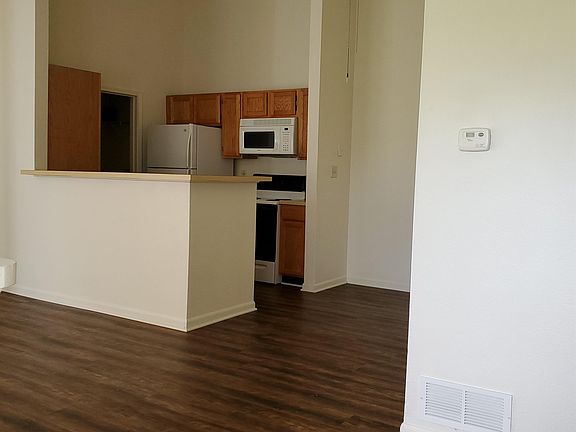 open floor plan living, dining, kitchen