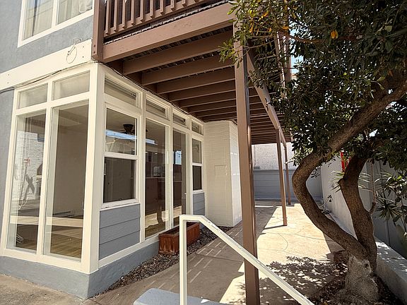 Side view of the apartment. It is the bottom unit with the private patio space.