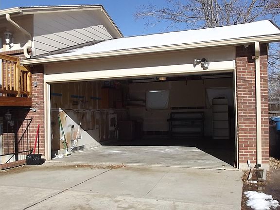 2 car over-sized attached garage with opener and remote