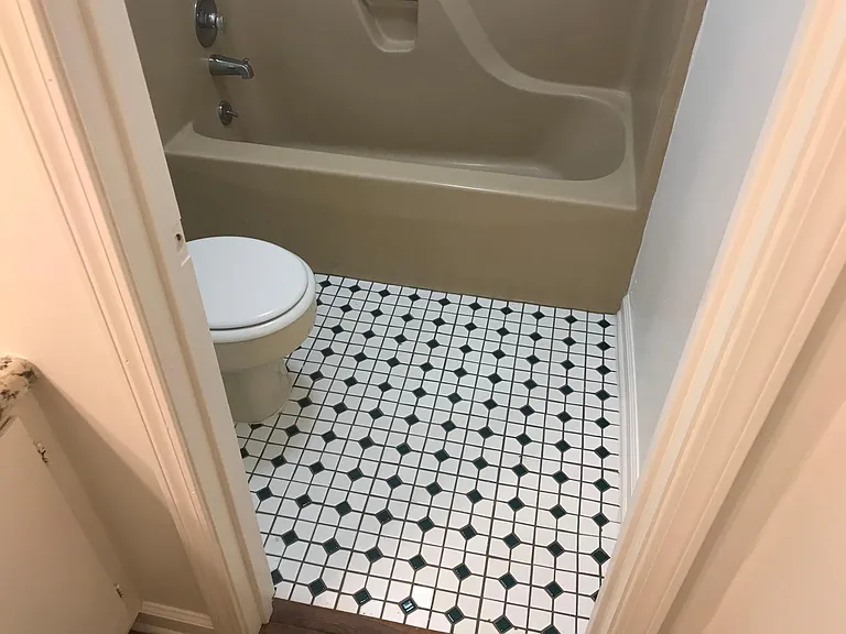 Master bath with tile floor.